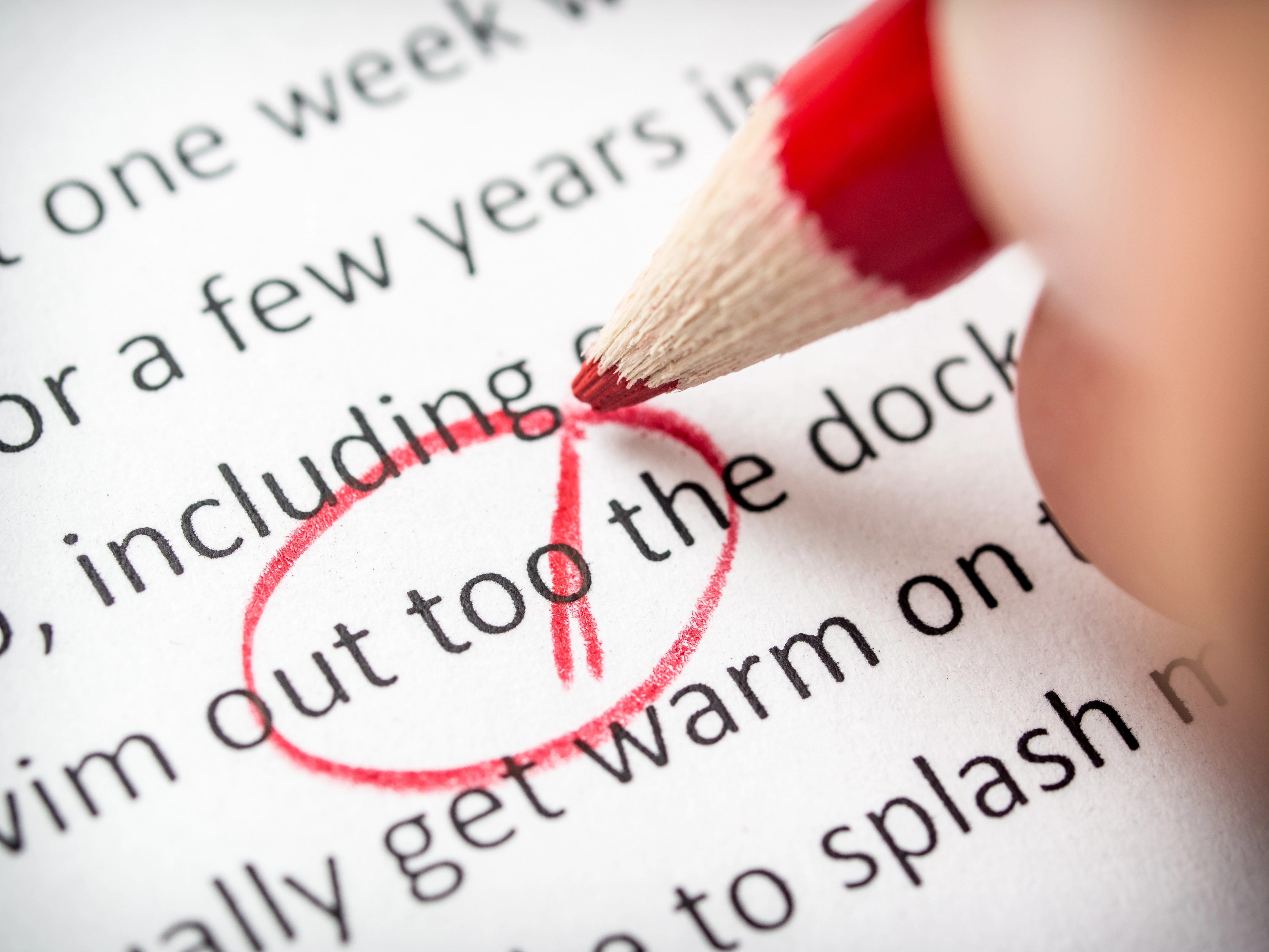 An image of a person editing a document that demonstrates the top-quality proofreading and editing from this company.